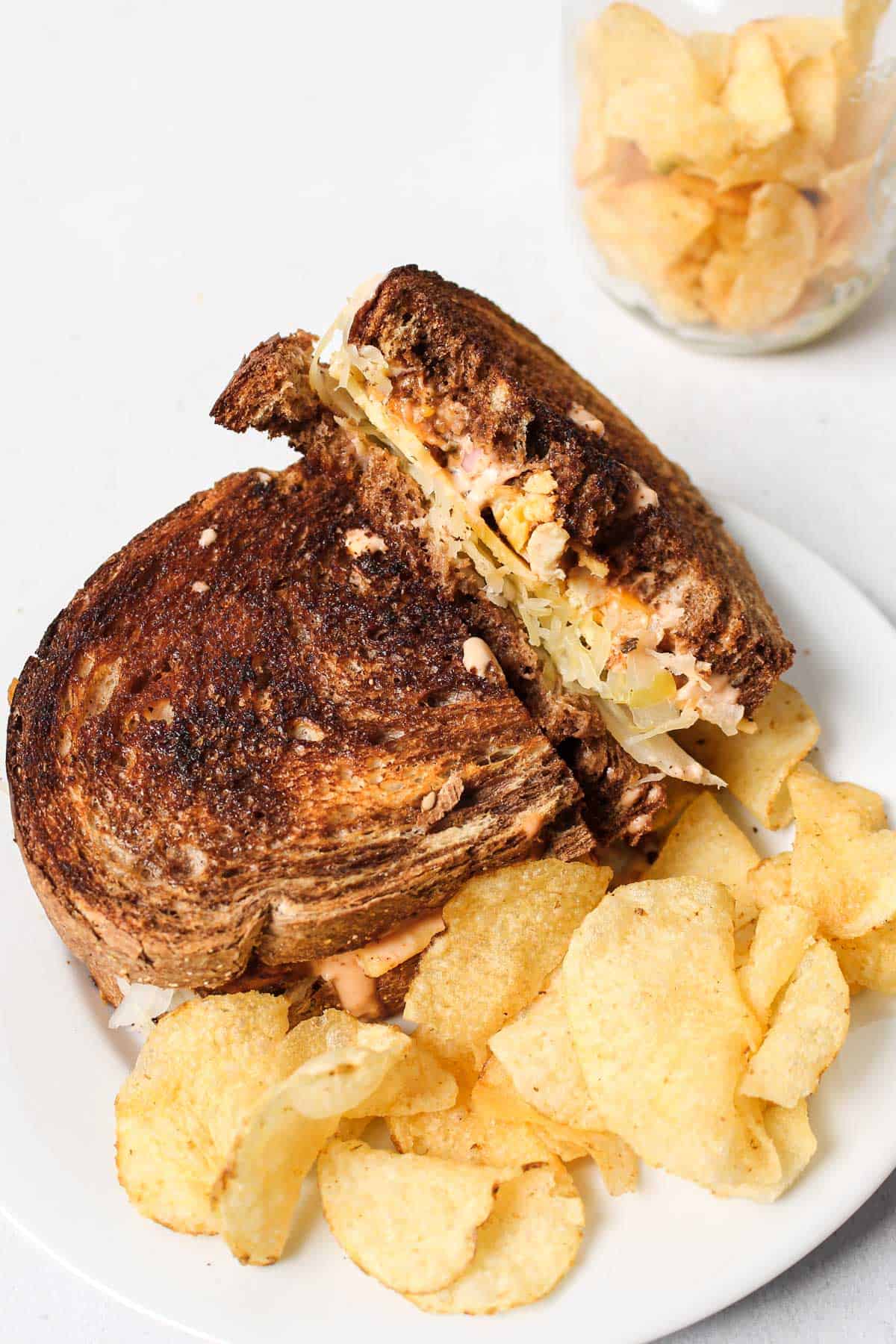 Plated sandwich with potato chips