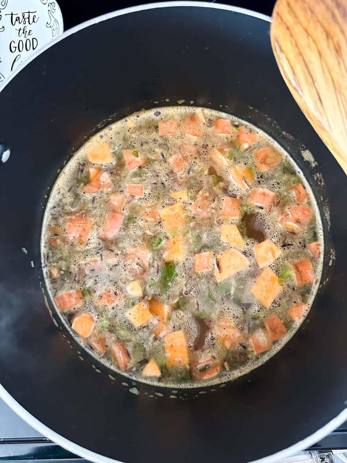 Black-eyed pea soup cooking on stove top