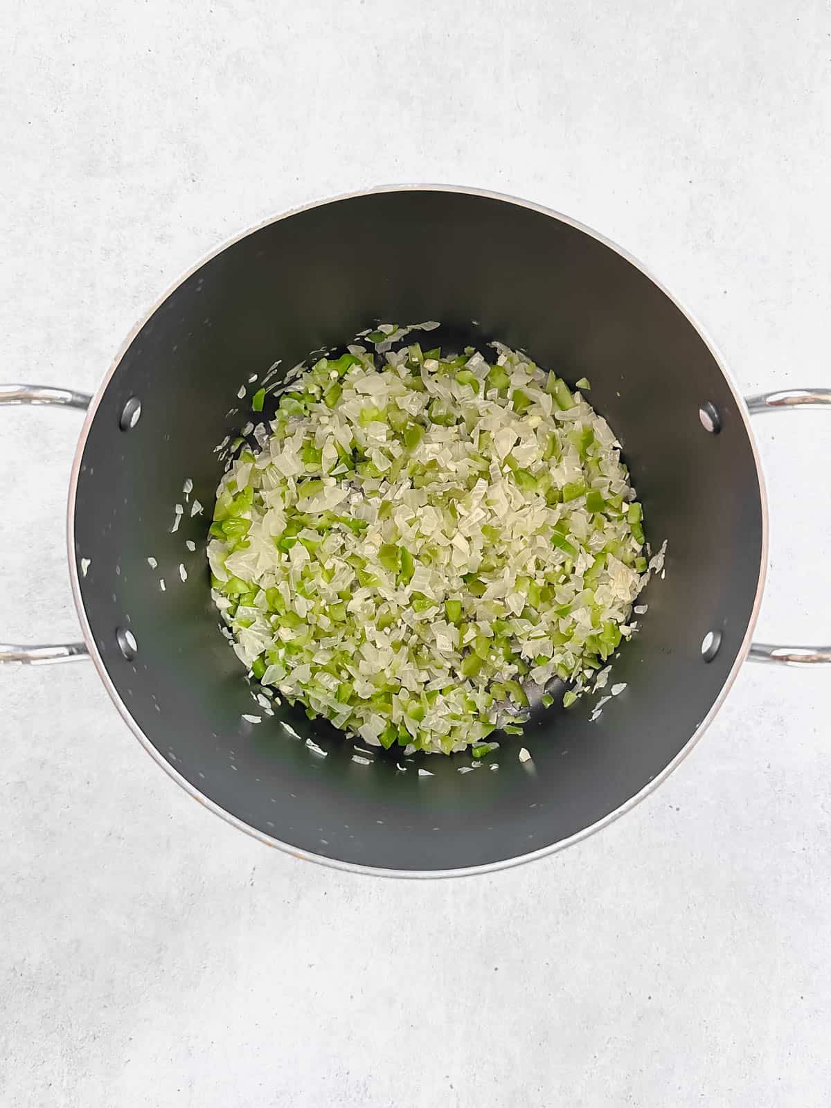 Sautéd onions, green pepper and garlic in soup pot