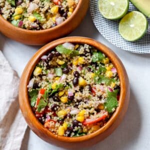 Black Bean, corn, and quinoa salad served in wooden bowls