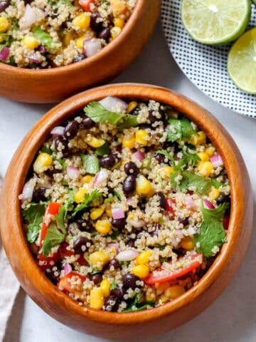 Black Bean, corn, and quinoa salad served in wooden bowls
