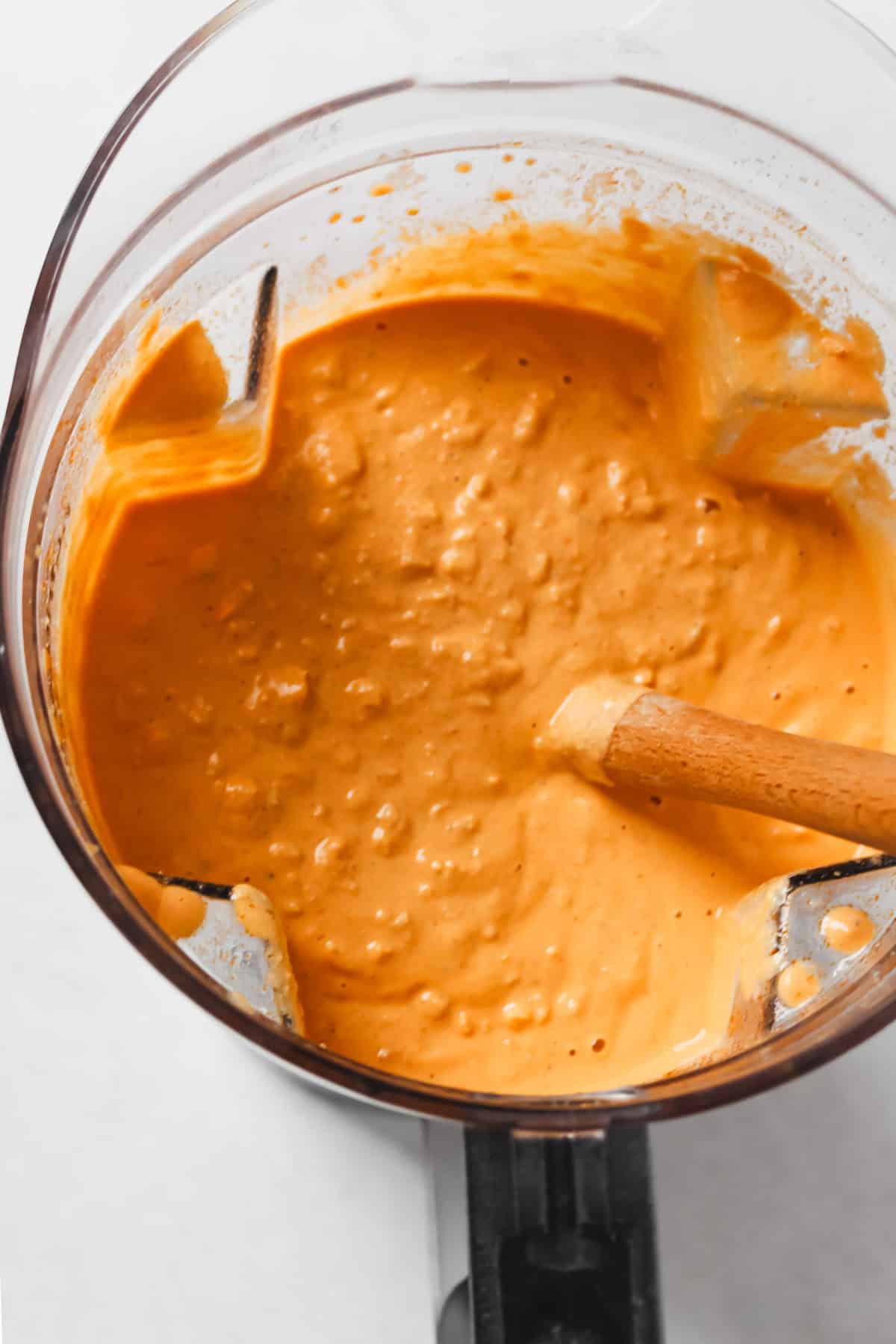 Chickpeas pulsed in blender with spatula