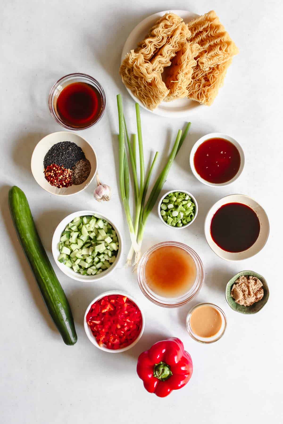 Individual recipe ingredients in bowls on a white background
